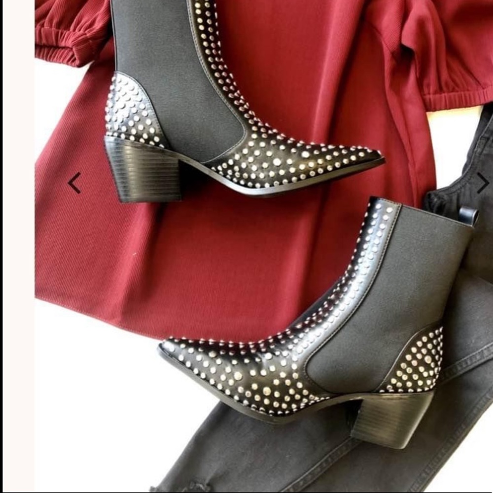 Black studded boots run a big fit more like a 6.5